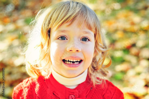 Photo: little girl missing her first tooth little girl missing her first tooth