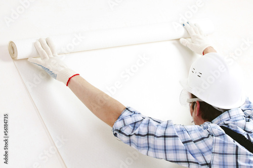 Photo: attaching wallpaper attaching wallpaper