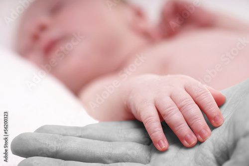 Photo: Hand von einem Baby Hand von einem Baby