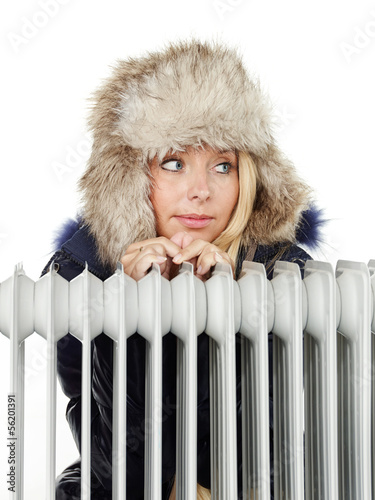 Photo: Winter lady with cap and radiator Winter lady with cap and radiator