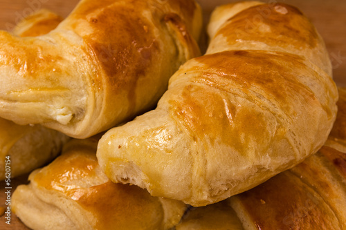 Photo: closeup of pile croissants closeup of pile croissants