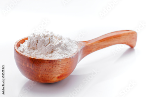 Photo: classic wooden dipper with flour classic wooden dipper with flour