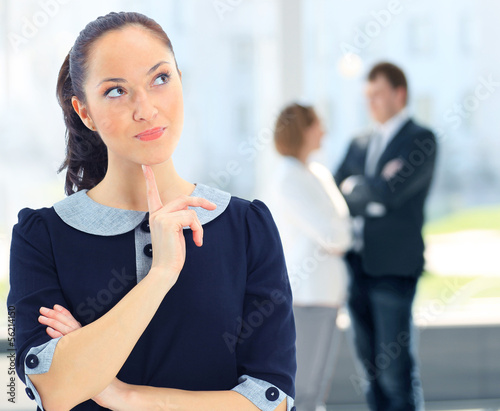 Photo: Closeup portrait of cute young business woman smiling Closeup portrait of cute young business woman smiling