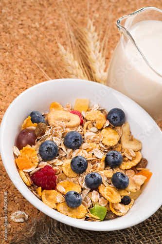 Photo: Muesli with pieces of fruit blueberries and raspberries Muesli with pieces of fruit blueberries and raspberries