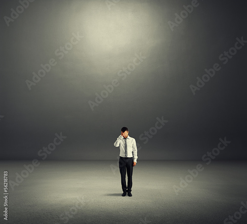 Photo: man in dark room man in dark room