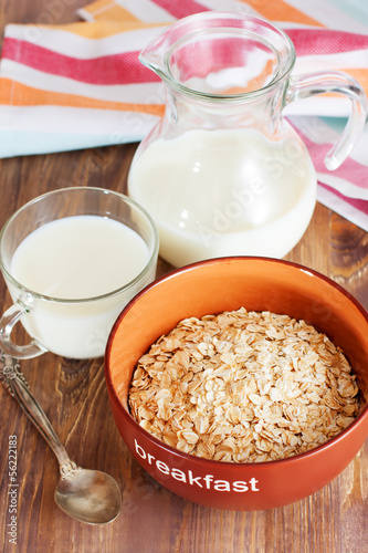 Photo: Healthy breakfast with bowl of oat flakes Healthy breakfast with bowl of oat flakes