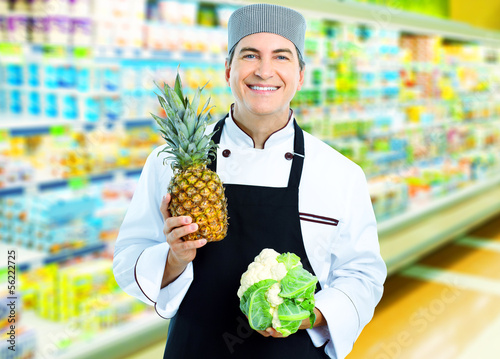 Photo: Chef in supermarket. Chef in supermarket.