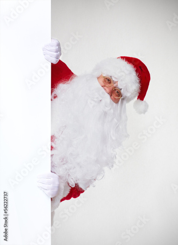 Photo: Christmas Santa with banner. Christmas Santa with banner.
