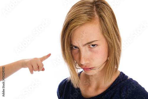 Photo: A mean bully pointing at a child A mean bully pointing at a child