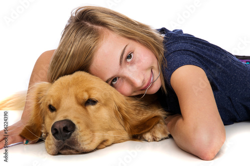 Photo: Young girl resting with her dog Young girl resting with her dog