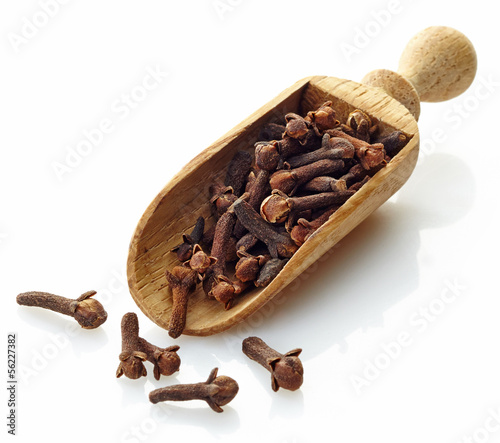 Photo: wooden scoop with cloves wooden scoop with cloves