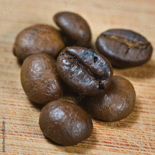 Photo: Coffee on grunge wooden background Coffee on grunge wooden background