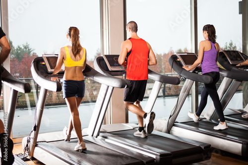 Photo: People running on treadmills People running on treadmills