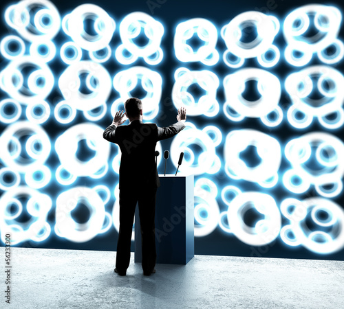Photo: businessman standing on rostrum businessman standing on rostrum