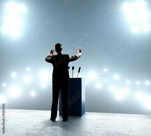 Photo: businessman standing on podium businessman standing on podium
