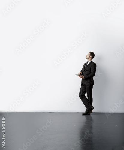 Photo: businessman with touch pad businessman with touch pad