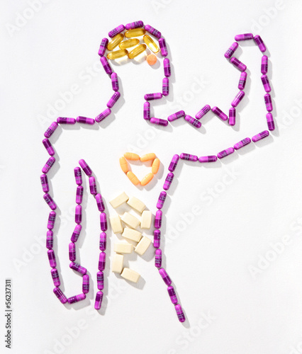 Photo: Pill man - figure of man made of pills Pill man - figure of man made of pills