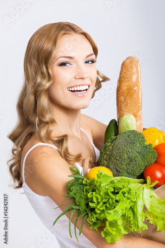 Photo: Woman with vegetarian food Woman with vegetarian food