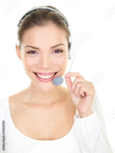 Photo: Headset woman smiling call center customer service Headset woman smiling call center customer service