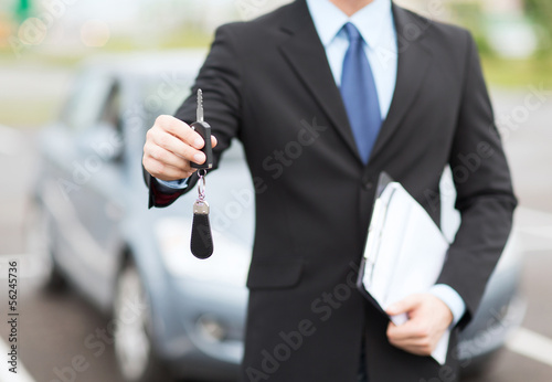 Photo: man with car key outside man with car key outside