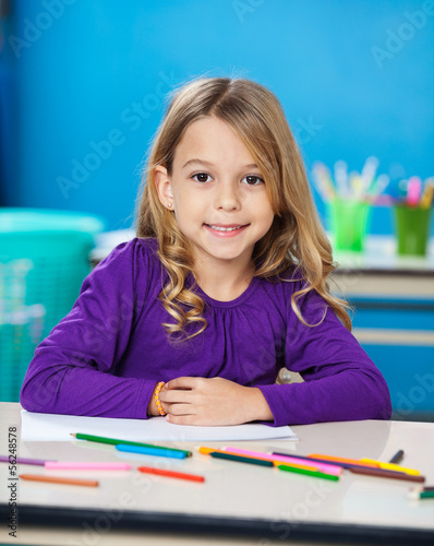 Photo: Girl With Sketch Pens And Paper In Kindergarten Girl With Sketch Pens And Paper In Kindergarten