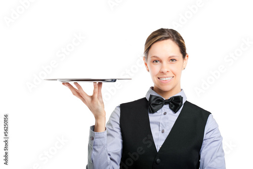 Photo: Female waiter holding an empty dish Female waiter holding an empty dish