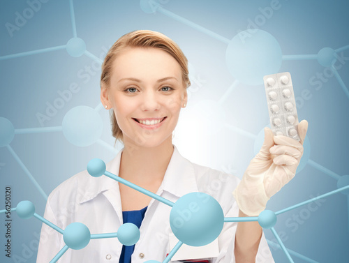 Photo: attractive female doctor with pills attractive female doctor with pills