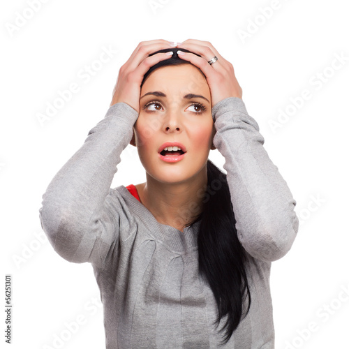 Photo: Portrait of unhappyyoung woman - isolated Portrait of unhappyyoung woman - isolated
