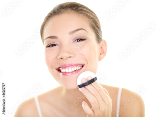 Photo: Makeup beauty Asian woman applying foundation face Makeup beauty Asian woman applying foundation face