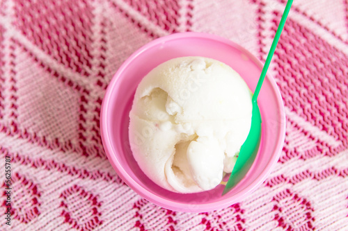 Photo: Coconut milk ice cream in a plastic cup pink Coconut milk ice cream in a plastic cup pink
