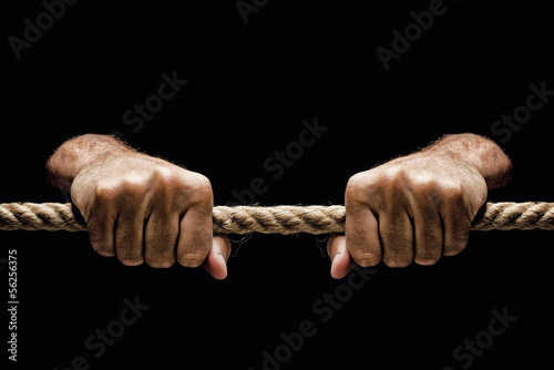 Photo: Holding tight rope Holding tight rope