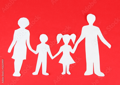 Photo: Family from paper on bright background Family from paper on bright background