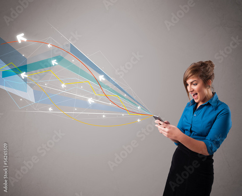 Photo: pretty young lady holding a phone with colorful abstract lines a pretty young lady holding a phone with colorful abstract lines a