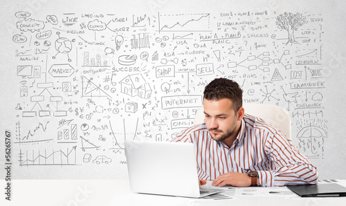 Photo: Businessman planning and calculating with various business ideas Businessman planning and calculating with various business ideas