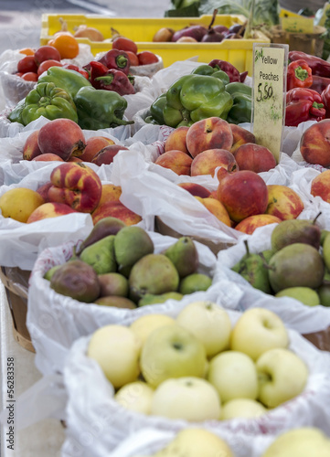 Photo: Baskets of fresh fruit and vegetables at a farmer's market Baskets of fresh fruit and vegetables at a farmer's market