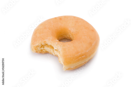 Photo: Bitten doughnut or donut isolated on white background Bitten doughnut or donut isolated on white background