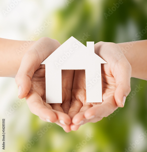 Photo: hands holding house hands holding house