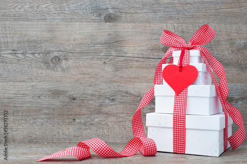 Photo: Stack of gift boxes with ribbon and bow Stack of gift boxes with ribbon and bow