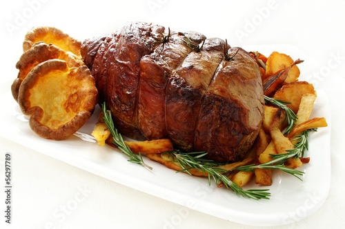 Photo: Roast beef joint with vegetables and Yorkshire pudding Roast beef joint with vegetables and Yorkshire pudding