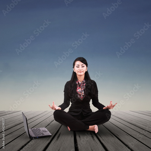 Photo: Businesswoman relaxing outdoor Businesswoman relaxing outdoor