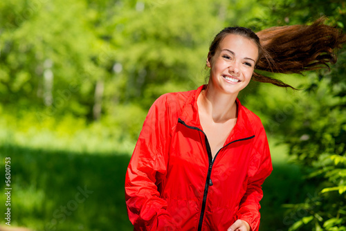 Photo: healthy young female athlete running healthy young female athlete running