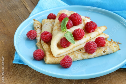 Photo: pancakes (crepes) with raspberries and mint pancakes (crepes) with raspberries and mint