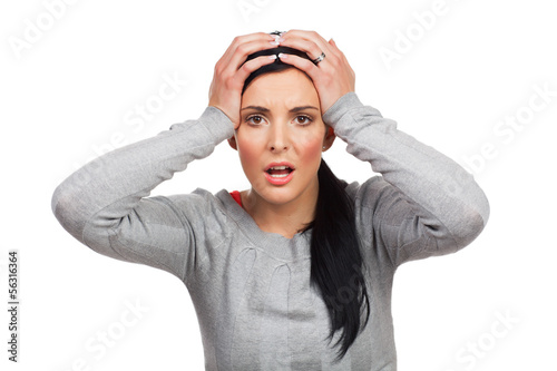 Photo: Portrait of young unhappy woman - isolated Portrait of young unhappy woman - isolated