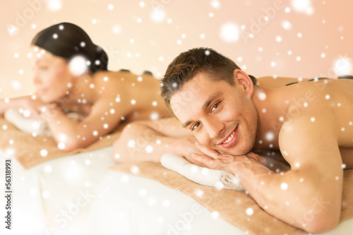 Photo: couple in spa with hot stones couple in spa with hot stones