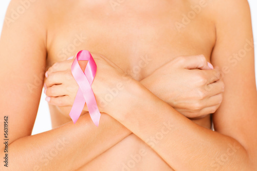 Photo: naked woman with breast cancer awareness ribbon naked woman with breast cancer awareness ribbon