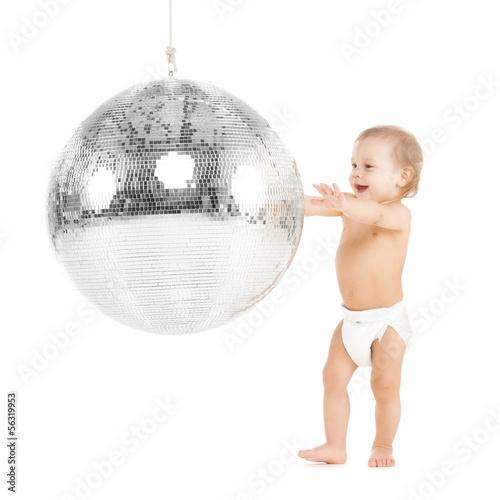 Photo: toddler playing with disco ball toddler playing with disco ball