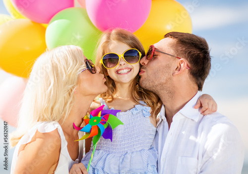 Photo: family with colorful balloons family with colorful balloons