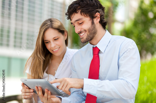 Photo: Businesspeople using a tablet Businesspeople using a tablet
