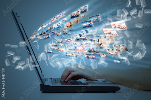 Photo: Hands with laptop computer keyboard. Hands with laptop computer keyboard.