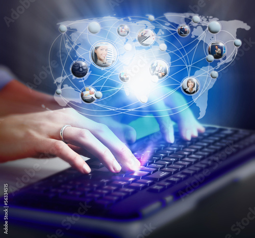 Photo: Hands with a computer keyboard. Hands with a computer keyboard.